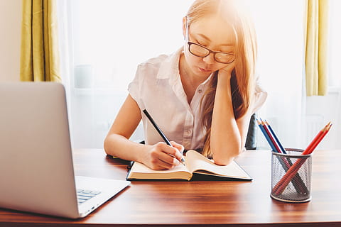 young, woman, taking, note, using, laptop, studying, home, eyeglasses, glasses, computer, wireless technology, technology, table, communication, one person, adult, working, sitting, indoors, women, connection, desk, blond hair, business, furniture, hair, using laptop, 5K
