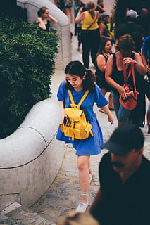 woman, blue, dress, yellow, knapsack, walking, people, crowd, daylight, wear, group of people, women, real people, lifestyles, child, childhood, leisure activity, full length, men, females, costume, day, togetherness, boys, incidental people, high angle view, girls, architecture, outdoors, 2K, CC0, public domain, royalty free