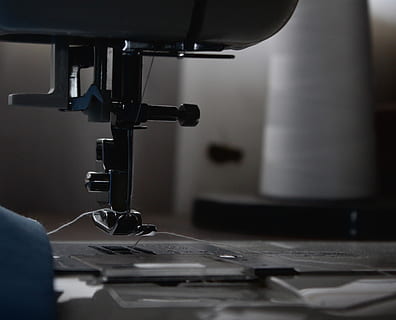 sewing machine, thread, fabric, stitching, metal, parts, room, craft, sewing, indoors, industry, machinery, technology, textile, occupation, close-up, manufacturing equipment, equipment, needle, textile industry, sewing needle, factory, selective focus, working, machine part, tailor, 2K, CC0, public domain, royalty free