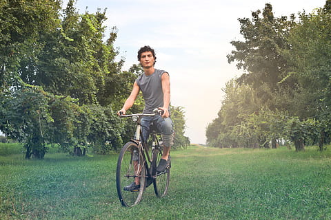 young, farmer, gray, sleeveless vest, riding, bicycle, meadow, 30-35 years, bicycling, bike, eye contact, green, grey, looking at camera, old, outdoors, park, trees, boy, country, countryside, day, daytime, greenery, happiness, man, nature, one man only, people, vest, vintage, plant, tree, one person, smiling, grass, young adult, lifestyles, portrait, transportation, leisure activity, young men, casual clothing, real people, front view, full length, cycling, land, 2K