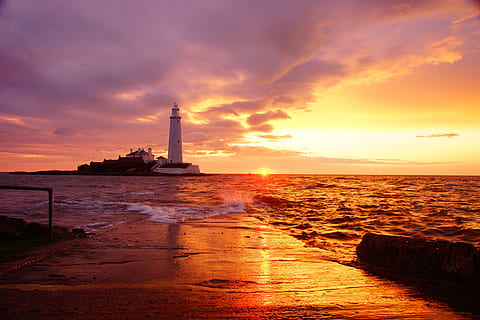 lighthouse during sunset, clouds, dawn, dusk, lighthouse, nature, ocean, sea, seascape, seashore, sky, sun, sunrise, sunset, water, guidance, architecture, tower, beach, built structure, cloud - sky, building exterior, land, scenics - nature, travel destinations, beauty in nature, building, no people, outdoors, horizon over water, 5K, CC0, public domain, royalty free