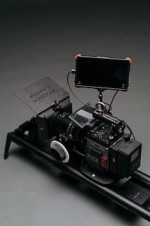 černý fotoaparát, Fotoaparát, elektronika, Zobrazit, videokamera, počítač, digitální fotoaparát, doplněk, bts, video, dsmc2, kinematografie, objektiv, stavět, podnikání, technologie, prozkoumat, baterie, videografie, Šedá, pozadí, uvnitř, fotografická témata, fotoaparát - fotografické vybavení, stálý život, studio shot, detail, nikdo, stůl, fotografické vybavení, spojení, bezdrátové technologie, sdělení, šedá, zařízení, Černá barva, 8K, CC0, veřejná doména, bez autorských práv
