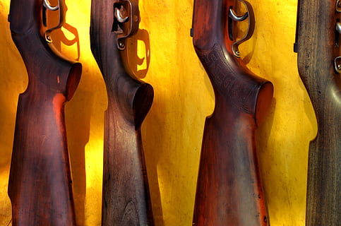 old guns, safety, Tools, string instrument, yellow, musical instrument, no people, close-up, wood - material, music, musical equipment, indoors, metal, day, choice, industry, brown, design, group of objects, backgrounds, variation, guitar, wall - building feature, metal industry, 2K, CC0, public domain, royalty free