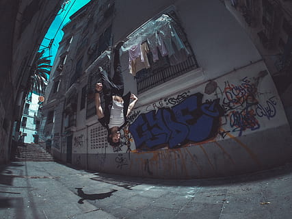 man, performing, backflip, house, person, human, people, building, algeria, annaba, alleyway, alley, street, graffiti, shadow, upside down, road, urban, town, city, electronics, console, emblem, parkour, full length, architecture, one person, real people, built structure, building exterior, young adult, day, leisure activity, mid-air, casual clothing, lifestyles, young women, women, creativity, art and craft, outdoors, 4K, CC0, public domain, royalty free