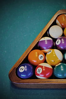 balls, colours, pool ball, table, sport, ball, multi colored, still life, number, pool table, indoors, no people, triangle shape, pool - cue sport, high angle view, arrangement, large group of objects, leisure activity, close-up, wood - material, shape, sphere, 1080P, CC0, public domain, royalty free