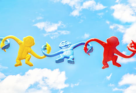 sky, clouds, art, puppet, monkey, colorful, crafts, cloud - sky, animal representation, representation, toy, nature, holiday, blue, day, yellow, no people, animal, low angle view, outdoors, fun, flying, animal themes, inflatable, plastic, 4K, CC0, public domain, royalty free