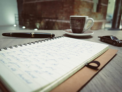 closeup, photo, blue, pen, tinted, spiral notepad, placed, beside, die, cast car, coffee cup, coffee, composition, desk, notes, writing, table, indoors, paper, communication, still life, selective focus, text, close-up, no people, mug, cup, furniture, drink, wood - material, food and drink, wireless technology, glasses, 4K, CC0, public domain, royalty free