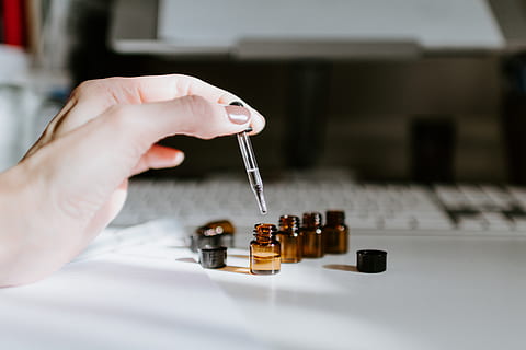 brown, bottle, table, human hand, hand, human body part, one person, holding, adult, indoors, body part, close-up, unrecognizable person, women, finger, human finger, selective focus, relaxation, focus on foreground, strategy, day, human limb, 5K, CC0, public domain, royalty free
