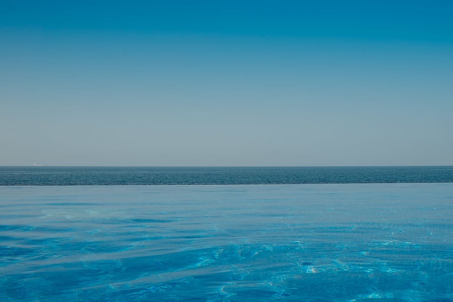 pool, infinity, sea, summer, water, blue, lagoon, hotel, resort, relax, chill, horizon, horizon over water, sky, beauty in nature, tranquility, scenics - nature, tranquil scene, nature, clear sky, no people, idyllic, outdoors, copy space, day, seascape, waterfront, turquoise colored, 1080P