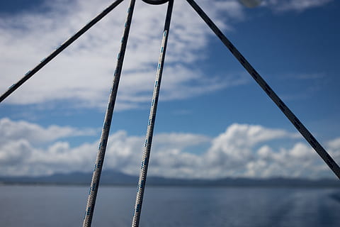 fiji, rigging, clouds, ropes, blue, sea, horizon, cloud - sky, sky, no people, metal, focus on foreground, water, day, nature, tranquility, rope, outdoors, lake, close-up, beauty in nature, connection, built structure, rod, low angle view, steel, alloy, 5K, CC0, public domain, royalty free