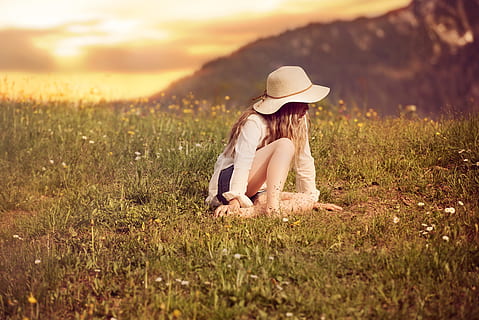 blonde, girl, woman, field, nature, landscape, grass, hat, plant, land, clothing, sunlight, summer, sky, one person, sitting, sunset, casual clothing, adult, hair, girls, women, leisure activity, hairstyle, outdoors, freedom, sun hat, 5K, CC0, public domain, royalty free