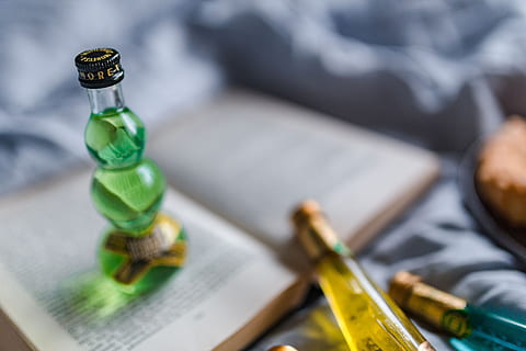 group, colorful, little, bottles, liqueurs, book, drink, read, time, top view, bed, alcohol, liquor, reader, bed time, cocktails, alcoholism, bottle, indoors, paintbrush, brush, selective focus, container, close-up, creativity, beer bottle, no people, high angle view, paper, paint, skill, furniture, art and craft, table, focus on foreground, day, green color, art and craft equipment, small group of objects, 5K, CC0, public domain, royalty free