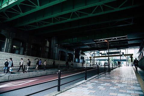 people, walking, street, commute, commuters, commuting, pavement, pedestrians, underpass, architecture, built structure, real people, group of people, transportation, men, rail transportation, railroad station platform, large group of people, city, crowd, lifestyles, railroad station, women, building exterior, day, railroad track, adult, public transportation, outdoors, track, architectural column, waiting, 5K, CC0, public domain, royalty free