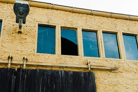 windows, destroyed, destroy, broken, glas, wall, house, built structure, architecture, low angle view, building exterior, no people, window, building, day, wall - building feature, blue, outdoors, residential district, metal, yellow, old, animal, pipe - tube, animal themes, 2K, CC0, public domain, royalty free