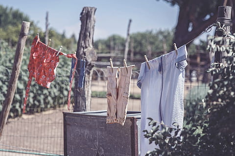 laundry on clothesline, various, hanging, drying, clothesline, laundry, clothing, focus on foreground, textile, no people, clothespin, plant, day, nature, architecture, washing, tree, built structure, building exterior, outdoors, building, close-up, 4K, CC0, public domain, royalty free