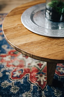 dutch-inspired home, interior, interior design, room, home, living room, accesories, scandi, scandinavian, decorations, details, indoors, dutch, house, wood - material, table, no people, close-up, selective focus, still life, focus on foreground, high angle view, art and craft, day, pattern, creativity, brown, music, design, plate, musical equipment, arts culture and entertainment, wood, 2K