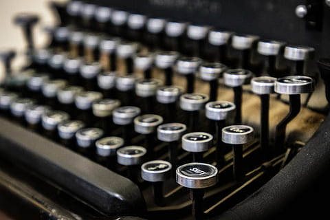 computer keyboard, electronics, hardware, keyboard, computer, computer hardware, word, weaponry, weapon, ammunition, machine, bullet, spiral, coil, text, building, factory, rotor, motor, manufacturing, technology, typewriter, letter, indoors, communication, western script, alphabet, close-up, antique, no people, retro styled, in a row, high angle view, selective focus, focus on foreground, push button, still life, old, 5K, CC0, public domain, royalty free