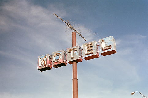 motel, sign, pole, sky, vintage, rust, cloud - sky, low angle view, day, nature, no people, communication, outdoors, direction, text, abandoned, symbol, guidance, old, run-down, wood - material, directional sign, information, 720P, CC0, public domain, royalty free