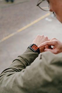 man, using, smartwatch, human hand, hand, real people, human body part, one person, lifestyles, selective focus, day, smart watch, time, wearable computer, adult, watch, wristwatch, focus on foreground, men, body part, connection, holding, checking the time, outdoors, finger, 4K, CC0, public domain, royalty free