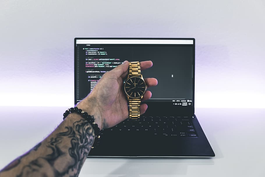 laptop, pc, computer, code, jewelry, gold, nixon, watch, human hand, hand, communication, wireless technology, connection, human body part, technology, one person, indoors, adult, tattoo, real people, using laptop, screen, business, day, close-up, human limb, finger, 5K