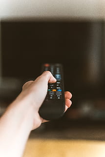 black remote, control, hand, human hand, human body part, technology, one person, holding, finger, selective focus, close-up, human finger, indoors, remote control, body part, communication, real people, lifestyles, leisure activity, arts culture and entertainment, push button, human limb, 5K, CC0, public domain, royalty free