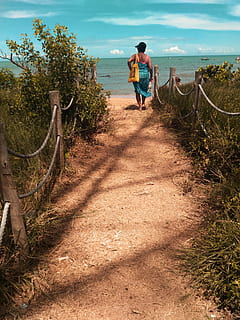 woman, wearing, blue, scarf, walking, pathway, bag, beach, clouds, daylight, environment, grass, hat, landscape, nature, ocean, outdoors, person, sand, scenic, sea, seashore, tree, water, way, real people, plant, lifestyles, leisure activity, land, full length, day, one person, beauty in nature, sky, casual clothing, women, rear view, men, growth, sunlight, adult, 4K, CC0, public domain, royalty free