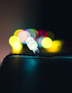 light, lightbulb, microphone, electrical device, flare, lighting, headlight, toothpaste, launch, stage, neon, contact lens, torch, finger, hand, light fixture, traffic light, glitter, cone, clinic, illuminated, multi colored, lighting equipment, night, glowing, no people, close-up, indoors, light - natural phenomenon, motion, studio shot, defocused, copy space, electricity, dark, lens flare, electric lamp, disco lights, 2K, CC0, public domain, royalty free