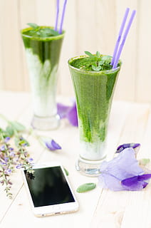 two, clear, parfait glasses, beverage, close-up, drinks, flora, flowers, fresh, freshness, green, healthy, juice, liquid, mint, nutritious, organic, smartphone, smoothie, drink, refreshment, food and drink, table, drinking straw, household equipment, drinking glass, straw, glass, healthy eating, wellbeing, green color, still life, no people, food, plant, indoors, herb, cocktail, 4K, CC0, public domain, royalty free