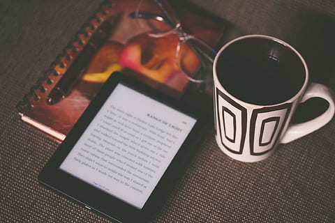 kindle, e-reader, technology, reading, book, objects, coffee, cup, mug, notebook, notepad, pen, eyeglasses, business, food and drink, drink, refreshment, indoors, coffee cup, no people, coffee - drink, text, food, close-up, communication, high angle view, still life, table, paper, freshness, western script, 1080P, CC0, public domain, royalty free
