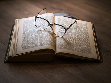 eyeglasses, open, book, antique, encyclopedia, knowledge, lexicon, literature, nostalgic, pages, reading, science, studying, vintage, still life, publication, table, glasses, indoors, education, paper, no people, close-up, wood - material, page, high angle view, text, expertise, communication, selective focus, absence, personal accessory, 4K, CC0, public domain, royalty free