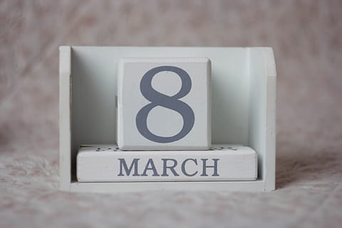 white wooden cube, calendar, conceptual, data, date, design, equipment, image, indoors, information, international women's day, march 8, reminder, communication, text, number, western script, sign, no people, close-up, single object, white color, focus on foreground, studio shot, day, wall - building feature, still life, government, selective focus, 5K, CC0, public domain, royalty free
