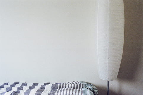bed, sheets, white, wall, lamp shade, light, bedroom, indoors, white color, no people, wall - building feature, chair, seat, home interior, furniture, copy space, sofa, pillow, pattern, still life, close-up, paper, relaxation, table, wood - material, textile, 2K, CC0, public domain, royalty free