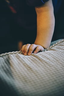 toddler, hand, cute, tiny, one person, human body part, human hand, selective focus, indoors, close-up, body part, casual clothing, real people, childhood, midsection, child, furniture, lifestyles, day, textile, clothing, men, jeans, 5K, CC0, public domain, royalty free