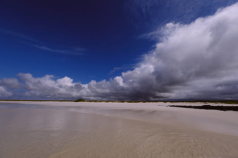 seashore, beach, clouds, ocean, sand, sea, seascape, shore, sky, cloud - sky, environment, landscape, scenics - nature, water, land, beauty in nature, nature, blue, no people, tranquility, day, outdoors, tranquil scene, desert, travel destinations, horizon, salt flat, semi-arid, 5K, CC0, public domain, royalty free