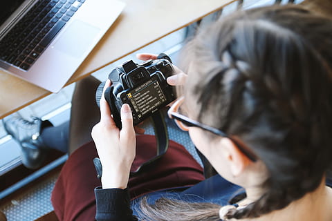 young, girl check, dslr camera, cafe, technology, adult, connection, wireless technology, women, communication, one person, holding, indoors, sitting, high angle view, computer, casual clothing, young adult, headshot, hair, day, photography themes, portrait, 5K