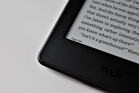 black, amazon, kindle, e-book reader, book, text, word, cell phone, mobile phone, phone, electronics, paper, computer, label, business card, keyboard, read, study, computer hardware, hardware, file folder, file binder, cushion, communication, close-up, western script, technology, indoors, wireless technology, no people, studio shot, white background, screen, copy space, still life, high angle view, black color, single object, connection, data, searching, 4K, CC0, public domain, royalty free