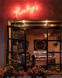 ruby, neon light signage, illuminated, architecture, text, built structure, communication, lighting equipment, night, building exterior, store, western script, neon, entrance, restaurant, no people, sign, business, commercial sign, red, cafe, outdoors, light, electric lamp, 2K, CC0, public domain, royalty free