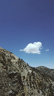 mountains under clouds, nature, outdoors, mountain, mountain range, slope, devil's backbone trail, united states, lytle creek, peak, sky, azure sky, cumulus, weather, cloud, blue, adventure, leisure activities, plant, tree, road, beauty in nature, scenics - nature, tranquility, cloud - sky, tranquil scene, day, no people, non-urban scene, low angle view, idyllic, landscape, environment, copy space, remote, rock, mountain peak, 2K, CC0, public domain, royalty free