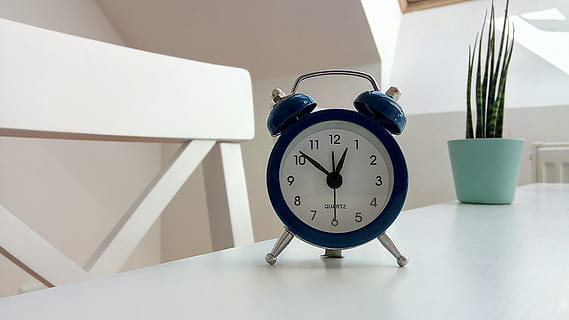 round, black, alarm clock, classic, count, countdown, deadline, minutes, retro, time, timer, clock, indoors, no people, table, home interior, still life, close-up, day, white color, furniture, architecture, focus on foreground, domestic room, window, staircase, low angle view, healthcare and medicine, clock face, minute hand, 4K, CC0, public domain, royalty free