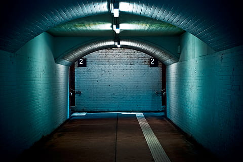 corridor, architecture, bricks, building, empty, hallway, tunnel, indoors, lighting equipment, the way forward, illuminated, direction, subway, no people, flooring, wall - building feature, dark, built structure, public transportation, transportation, light, arch, absence, ceiling, underpass, long, underground walkway, 4K, CC0, public domain, royalty free