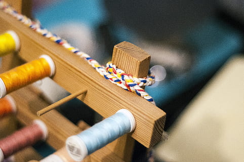 sewing, string, wood - material, musical instrument, indoors, no people, focus on foreground, leisure games, close-up, playing, large group of objects, high angle view, leisure activity, selective focus, arts culture and entertainment, multi colored, musical equipment, music, art and craft, relaxation, toy, industry, 4K, CC0, public domain, royalty free