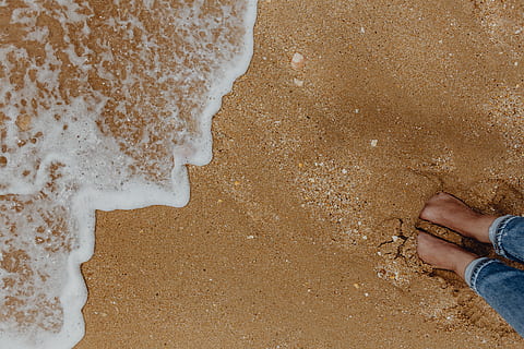 sand beach background, sea shells, &, pebbles, -, many, round, small, stones, beach, sand, background, texture, pattern, shells, seashells, human leg, low section, human body part, body part, one person, land, real people, water, standing, directly above, leisure activity, high angle view, lifestyles, aquatic sport, surfing, sea, human foot, human limb, limb, outdoors, 5K, CC0, public domain, royalty free