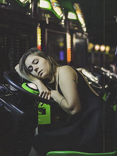 woman, sleeping, steering wheel, arcade, indoors, light, night, person, sleep, wear, one person, real people, portrait, lifestyles, young adult, young women, transportation, adult, women, mode of transportation, architecture, front view, leisure activity, hair, make-up, beauty, headshot, hairstyle, beautiful woman, 4K, CC0, public domain, royalty free