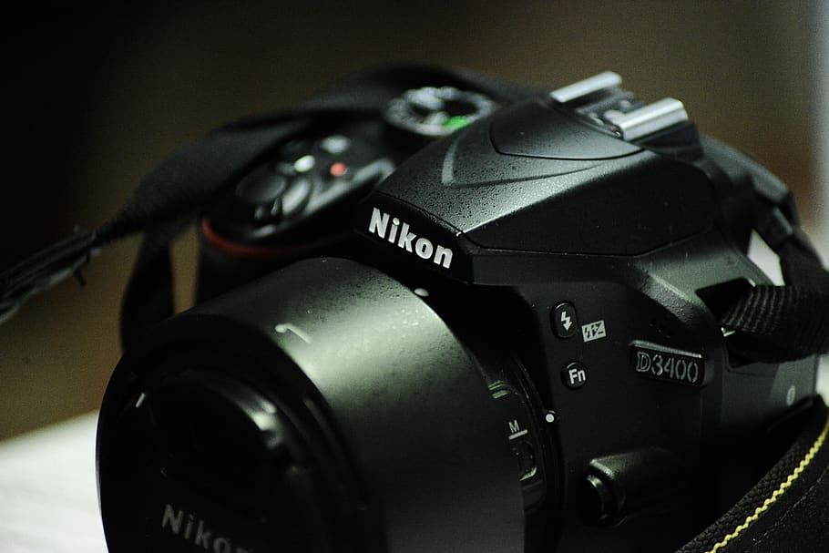 Càmera nikon d3400, càmera, electrònica, càmera digital, rellotge de polsera, gadget, tecnologia, technik, makro, fotografia, primer pla, nikon, dslr, oficina, negre, d3400, treballar, lent de la càmera, càmera de vídeo, tapa de lent, gris, temes de fotografia, equip fotogràfic, càmera - equip fotogràfic, cap gent, color negre, a l'interior, natura morta, equipament, lent - instrument òptic, fotografiar, modern, estil retro, centrar-se en primer pla, nombre, comunicació, càmera slr, equipament elèctric, 5K