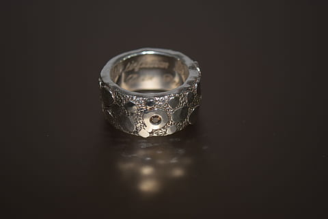 silver, ring, metal, object, round, rich, valuable, indoors, studio shot, close-up, single object, diamond - gemstone, jewelry, reflection, copy space, still life, no people, black background, diamond ring, table, wealth, shiny, wedding ring, luxury, selective focus, silver colored, 5K, CC0, public domain, royalty free