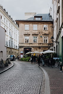 magic, first, polish, capital city, cracow, town, city, Poland, street, Europe, travel, polska, karkow, building exterior, architecture, built structure, group of people, women, men, real people, building, adult, walking, day, medium group of people, the way forward, transportation, cobblestone, direction, residential district, lifestyles, outdoors, 4K