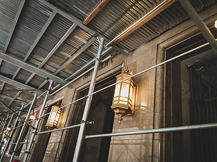 warm, lightroom, matte, lights, nyc, low angle view, lighting equipment, indoors, ceiling, illuminated, architecture, built structure, no people, hanging, electricity, pipe - tube, light, building, electric light, metal, glowing, day, wall - building feature, abandoned, electric lamp, architectural column, roof beam, 4K, CC0, public domain, royalty free