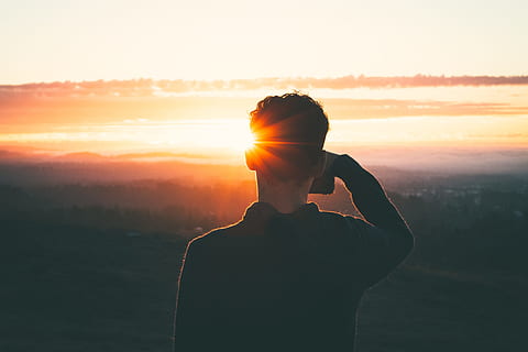silhouette photography, man, backlit, clouds, dawn, dusk, silhouette, sky, sunrise, sunset, one person, real people, lifestyles, leisure activity, sunlight, nature, standing, orange color, sunbeam, lens flare, beauty in nature, men, waist up, adult, sun, tranquility, bright, 5K, CC0, public domain, royalty free