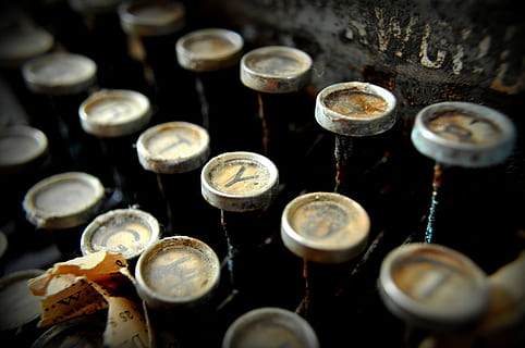 typewriter, selective focus, old, close-up, metal, no people, indoors, musical instrument, music, retro styled, still life, machinery, antique, high angle view, the past, arts culture and entertainment, in a row, machine part, rusty, history, 4K, CC0, public domain, royalty free