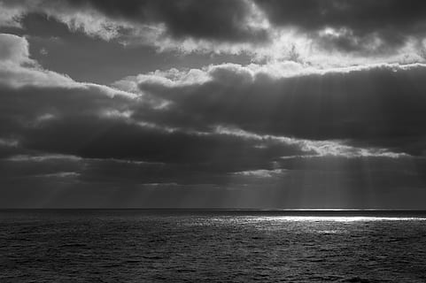 shadow, sunlight, filtered, highlight, white, black, black and white, bandw, cloud, weather, travel, vessel, cargo, cargo vessel travel, container ship travel, water, that time i crossed the atlantic on a cargo vessel because that's what i said i'd do, sun, ship, sea, sky, horizon, horizon over water, beauty in nature, cloud - sky, scenics - nature, storm, tranquility, storm cloud, sunbeam, nature, tranquil scene, no people, dramatic sky, overcast, waterfront, outdoors, ominous, power in nature, 4K, CC0, public domain, royalty free